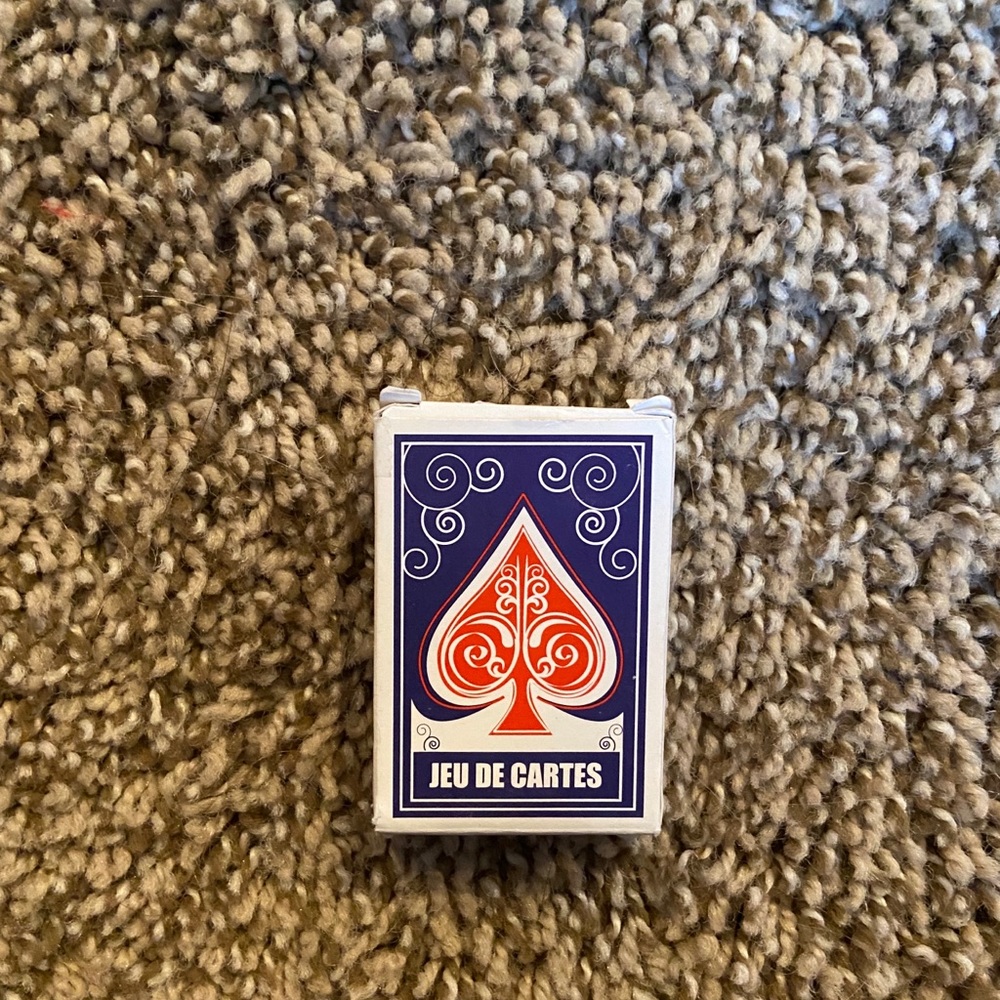 american girl playing cards
